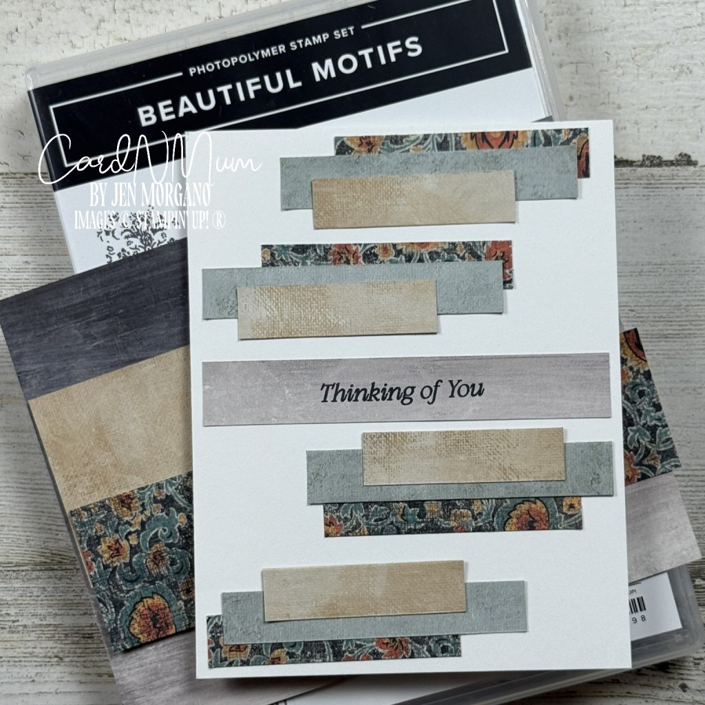 A handmade greeting card featuring the phrase 'Thinking of You' surrounded by various textured strips of patterned paper in soft colors. The card is displayed alongside a stamp set labeled 'Beautiful Motifs'.