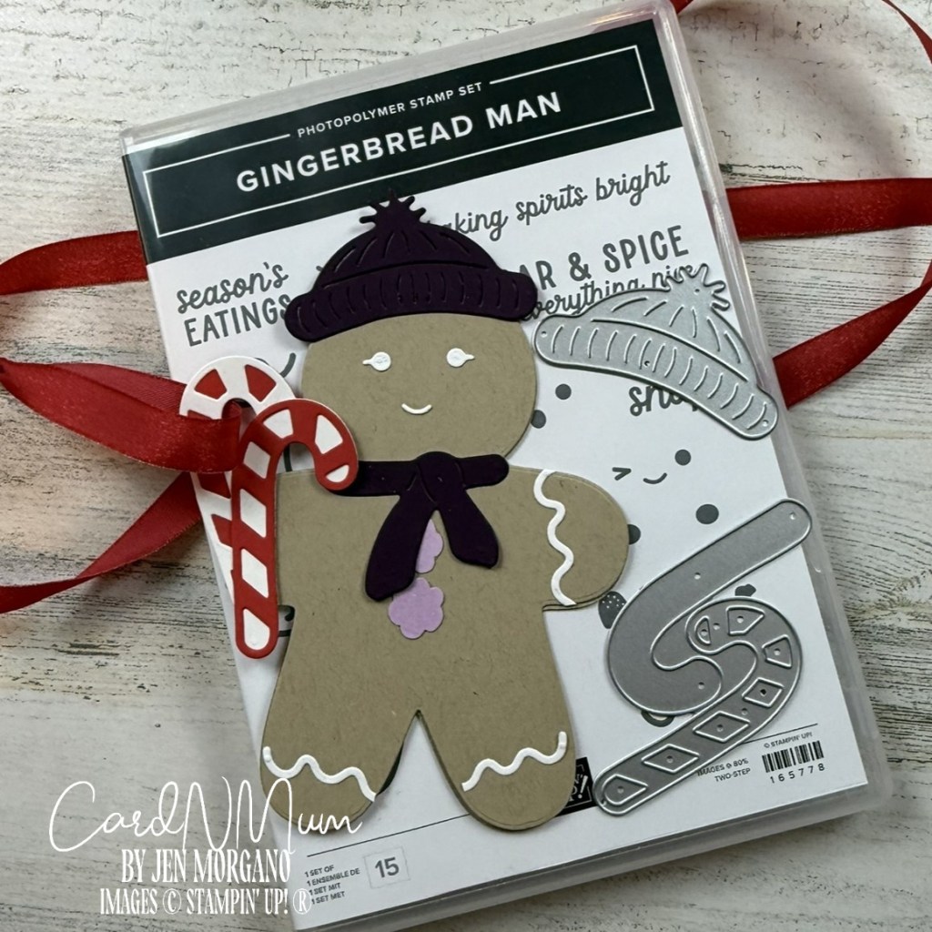 A Gingerbread Man stamp set from Stampin' Up!, featuring a gingerbread character with a candy cane, hat, and scarf, displayed on a wooden surface with a red ribbon.