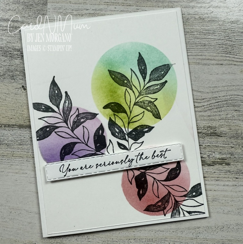 A handmade greeting card featuring colorful circular backgrounds in green, purple, and pink, with black leaf illustrations and the phrase 'You are seriously the best' prominently displayed.